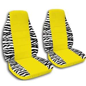 2 white and black zebra car seat covers with a yellow 