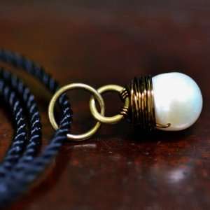 Sea Stone Pendant   white pearl wire wrapped in bronze with black cord