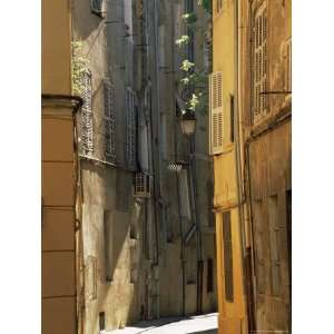Narrow Sunlit Street in Old Aix, Provence Alpes Cote DAzur, France 