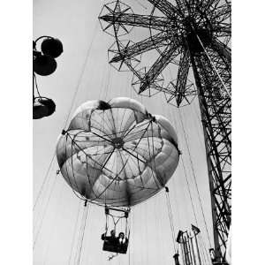  Couple Taking a Ride on the 300 Ft. Parachute Jump at 