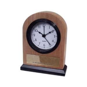 Solid ash alarm clock with rounded top and 3 x 1 gold plate.  