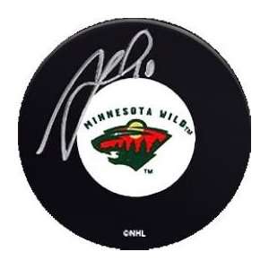  Marion Gaborik autographed Hockey Puck (Minnesota Wild 