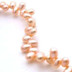   Peach 7mm Top Drilled Rice Freshwater Pearls Arts, Crafts & Sewing