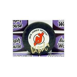  Neal Broten autographed New Jersey Devils Hockey Puck 
