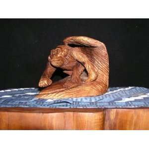    SURFING MONKEY AT PIPELINE 8  STAINED HAND CARVED