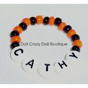   Halloween (White) Doll Name Bracelet for Chatty Cathy Toys & Games