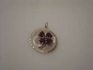 Circular M&M Sterling charm w/ clover in purple stones  