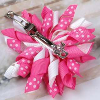 These two beautiful corker hair bows with the colors of pink and peach 