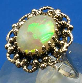 66 ct Opal, 14k Yellow Gold Ring, Broadflash fire  