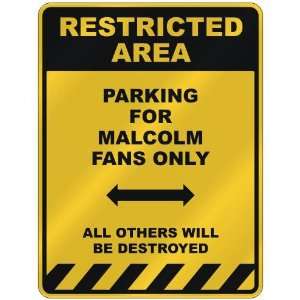   PARKING FOR MALCOLM FANS ONLY  PARKING SIGN NAME