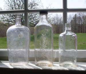 Vintage Clear Embossed Bottles  