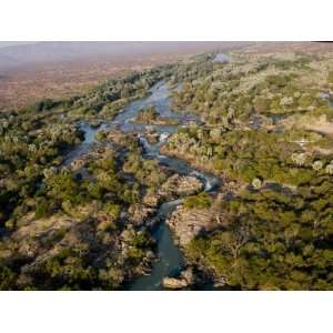  Cessna Above Trees Along the Banks of the Kunene River 