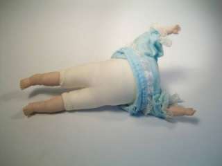 Unmarked Hard Plastic Doll Baby Doll Unusual Pose Laying Down  