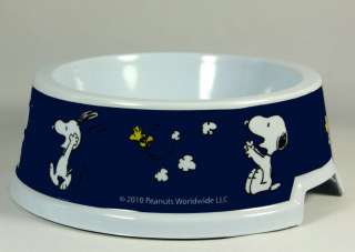 Durable melamine dog bowl with 2 cut out areas to allow for easy pick 