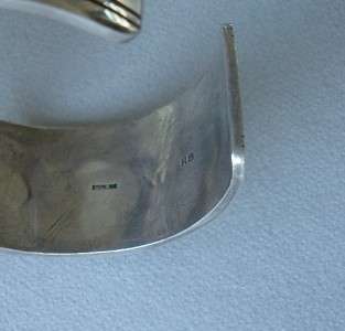 Signed Hopi sterling silver cuff in typical Hopi silver overlay work 