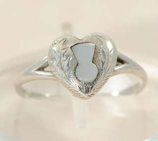 mother of pearl set Key To My Heart ring dating to the Edwardian 