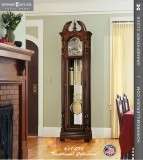 610985 Howard Miller Oak Grandfather Clock Traditional style bonnet 