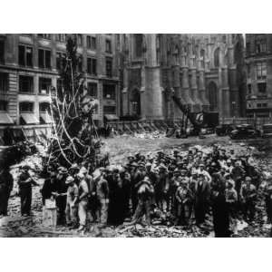  Construction Workers Line up for Pay Beside the First 