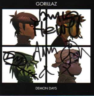 Album cover autographed by Damon Albarn, Jamie Hewlett, and Danger 