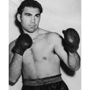  1938 photo Max Schmeling standing, wearing boxing trunks 