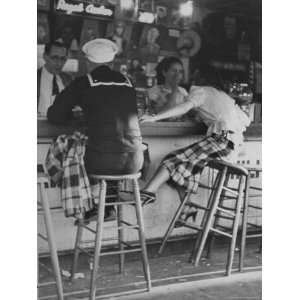  Sailor on Shore Leave Sitting at a Soda Fountain with 