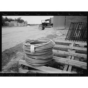  Photo Lead pipe, plumbing fixture storage in background 
